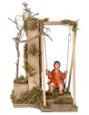 Child on swing series 12 cm in motion for Mondo nativity scene