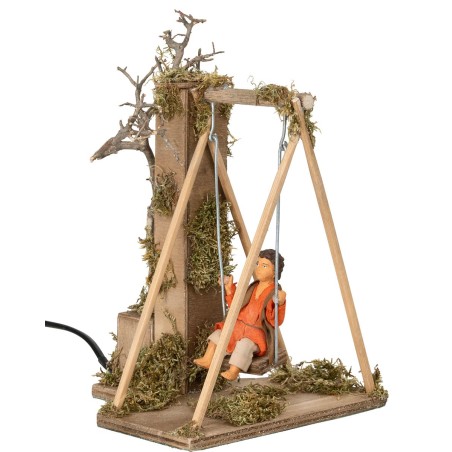 Bambino su altalena serie 12 cm in movimento per presepe Mondo