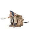 Agricultor con rastrillo serie 12 cm en movimiento para belén