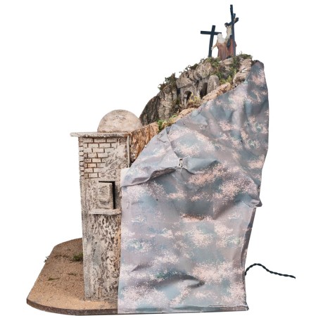 Illuminated Easter nativity scene complete with statues with