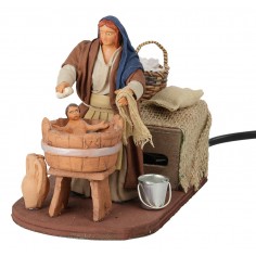 Donna che lava bimbo serie 12 cm in movimento per presepe Mondo