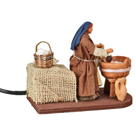 Donna che lava bimbo serie 12 cm in movimento per presepe Mondo