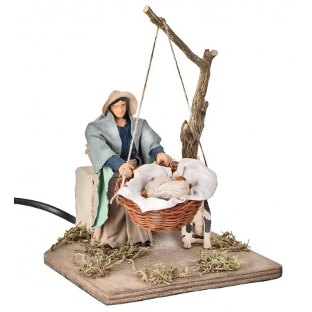 Mother with child in moving basket 12 cm for nativity scene