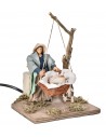 Mother with child in moving basket 12 cm for nativity scene