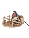 Campesina que alimenta a las gallinas en movimiento 12 cm