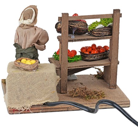 Fruttivendolo con banco in movimento 10 cm per presepe Mondo