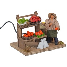 Fruttivendolo con banco in movimento 10 cm per presepe Mondo