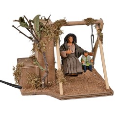 Mother and child on a moving swing 10 cm for nativity scene
