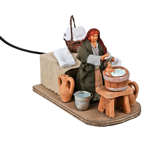 Woman washing child in motion 10 cm for Mondo nativity scene