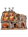 Illuminated Easter nativity scene with caves and complete tomb of