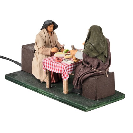 Famiglia a cena con bambino in movimento 10 cm per presepe