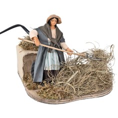 Peasant woman spreading straw in motion 12 cm for Mondo nativity scene