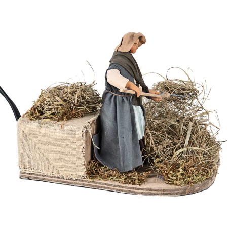 Peasant woman spreading straw in motion 12 cm for Mondo nativity scene