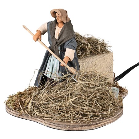 Contadina che spaglia in movimento 12 cm per presepe Mondo