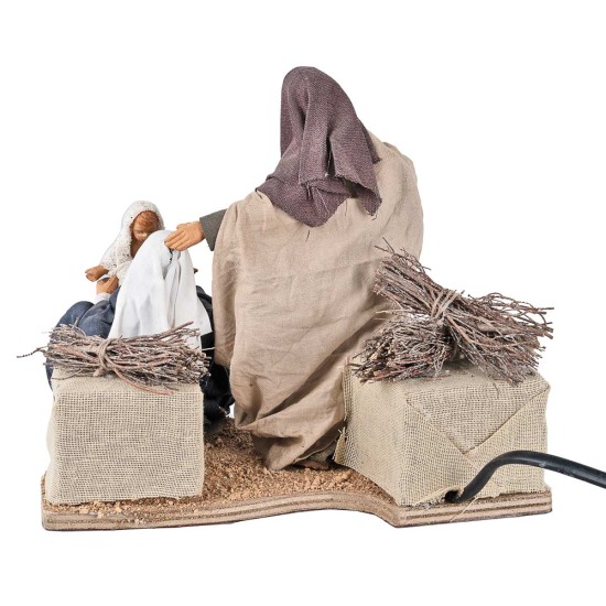 Nativity playing with a moving child 14 cm for nativity scene