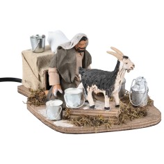 Man milking goat in motion 12 cm for Mondo nativity scene