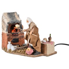 Panadero con horno en movimiento 14 cm para belén Mundo 2