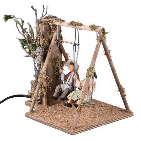 Children on a moving swing 24 cm for nativity scene Mondo Presepi