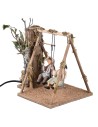 Bimbi su altalena in movimento 24 cm per presepe Mondo Presepi
