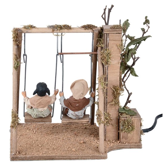 Children on a moving swing 24 cm for nativity scene Mondo Presepi