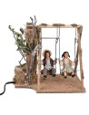 Bimbi su altalena in movimento 24 cm per presepe Mondo Presepi