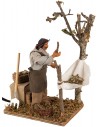 Man collecting moving olives 14 cm for nativity scene