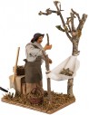 Man collecting moving olives 14 cm for nativity scene