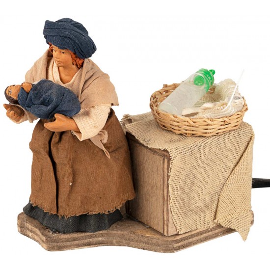 Mother breastfeeding baby in arms in motion 10 cm per