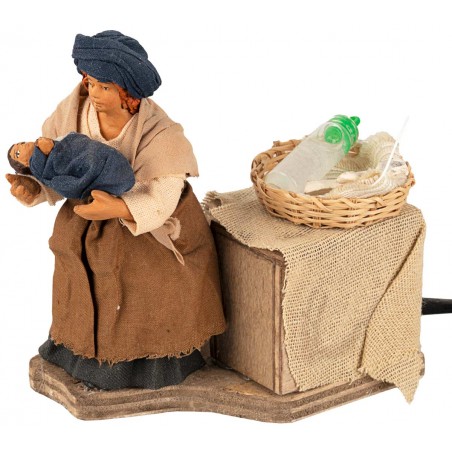 Mother breastfeeding baby in arms in motion 10 cm per