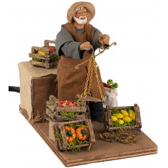 Fruttivendolo con bilancia in movimento 12 cm per presepe Mondo