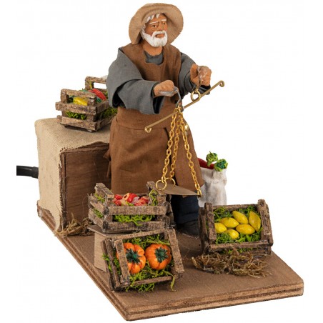 Fruttivendolo con bilancia in movimento 12 cm per presepe Mondo