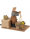 Fruttivendolo con bilancia in movimento 12 cm per presepe Mondo