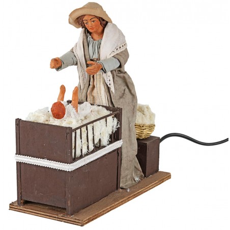 Mother with baby in moving cradle 24 cm for nativity scene