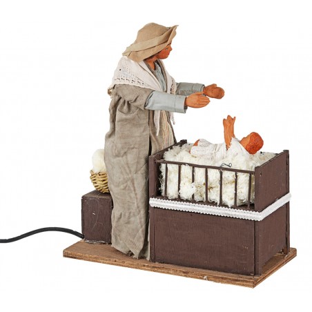 Mother with baby in moving cradle 24 cm for nativity scene