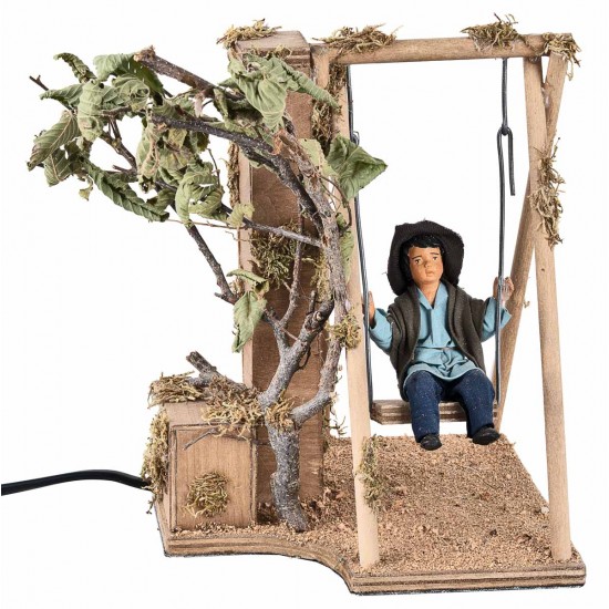 Child on a moving swing 24 cm for nativity scene Mondo Presepi
