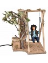 Bimbo su altalena in movimento 24 cm per presepe Mondo Presepi