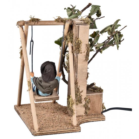 Child on a moving swing 24 cm for nativity scene Mondo Presepi