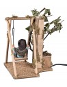 Child on swing in motion 24 cm