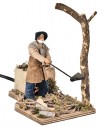 Lumberjack cutting single tree in motion 12 cm by