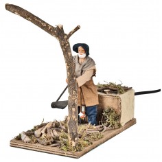 Lumberjack cutting single tree in motion 12 cm by 2