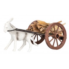 Straw wagon with donkey being towed
