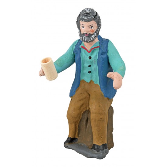 Hombre sentado con vaso en mano de la serie 10 cm en terracota