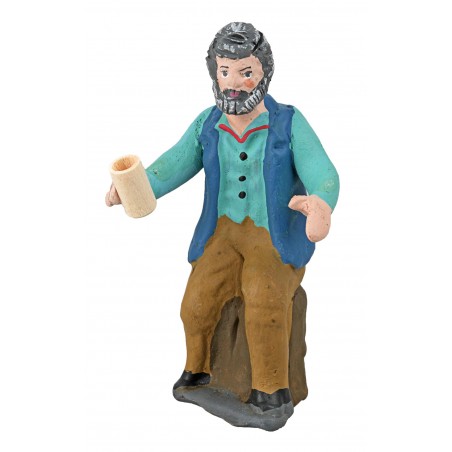 Seated man with glass in hand from the 10 cm series in painted