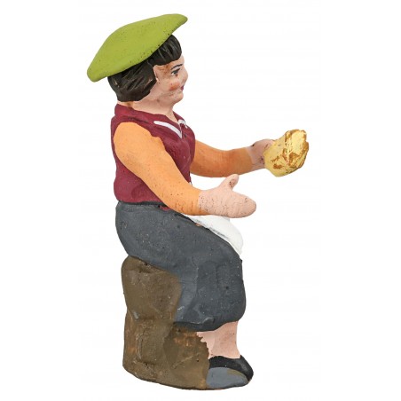 Mujer sentada con pan de la serie 10 cm en terracota pintada