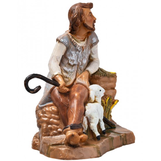 Seated shepherd with sheep from the 12 cm Fontanini series