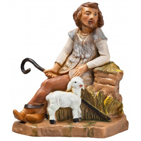 Seated shepherd with sheep from the 12 cm Fontanini series