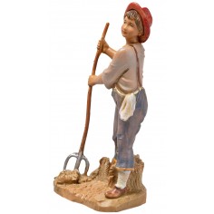 Boy with pitchfork in hand from the 12 cm Fontanini series 2