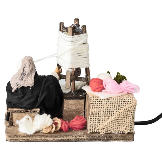 Old woman spinning wool 10 cm in motion for nativity scene World