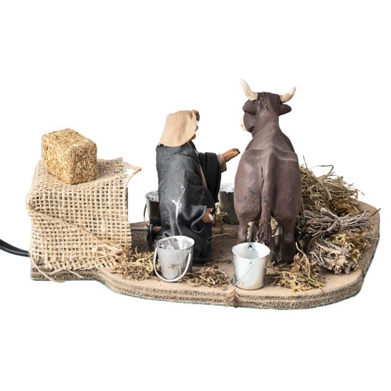 Uomo che munge mucca serie 10 cm in movimento per presepe Mondo