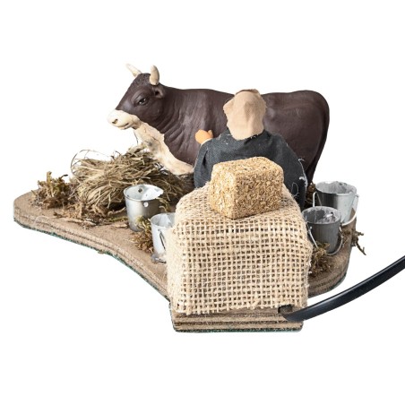 Uomo che munge mucca serie 10 cm in movimento per presepe Mondo